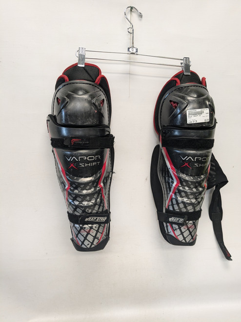 Vist Large View of Product Image Which is Used Bauer XSHIFT Junior Shin Guards Black 14" 11821-S000025845