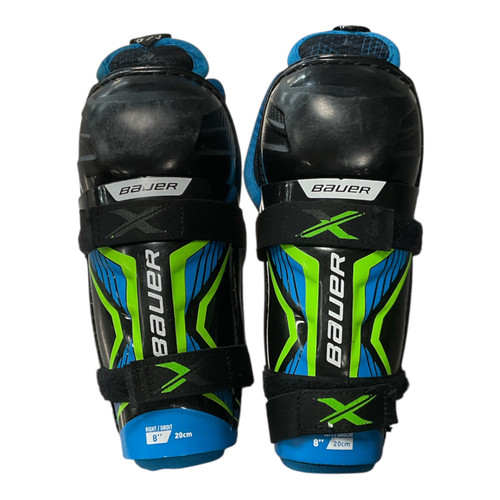 Vist Large View of Product Image Which is Used Bauer BAUER X SHIN Youth Shin Guards Black 8" 11362-S000161169