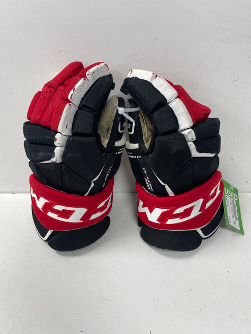 Vist Large View of Product Image Which is Used CCM TACKS CLASSIC PRO HOLE IN THUMBS Senior Gloves White/Black/Red 15"