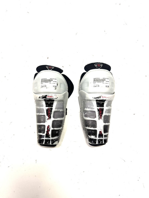 Vist Large View of Product Image Which is Used Bauer SUPREME 10 Youth Shin Guards White 8" 11860-S000294012