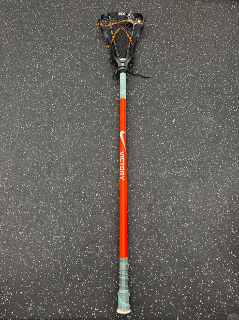 Vist Large View of Product Image Which is Used STX CRUX 300 W/NIKE VICTORY Wmn Atk/Mid Complete Stick Black