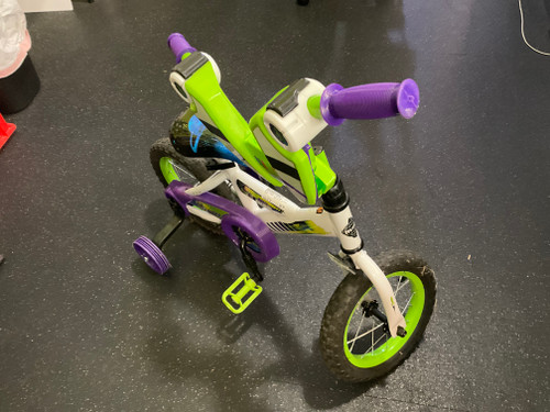 Vist Large View of Product Image Which is Used Huffy BUZZ LIGHTYEAR Training Wheel Bike Boys White 12" 11790-S000046930