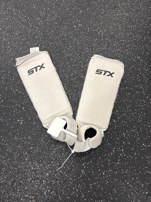 Vist Large View of Product Image Which is Used STX REVERSIBLE YOUTH SHINS FH Shin Guards White 10" 11726-S000284212