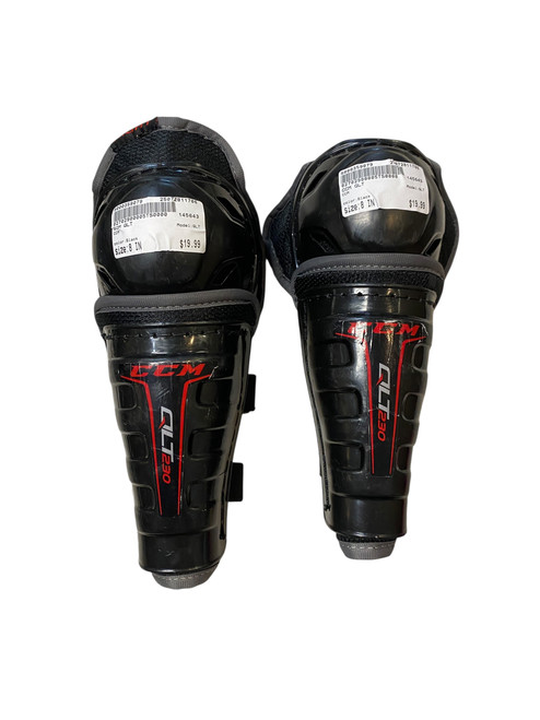 Vist Large View of Product Image Which is Used CCM QLT Youth Shin Guards Black 8"
