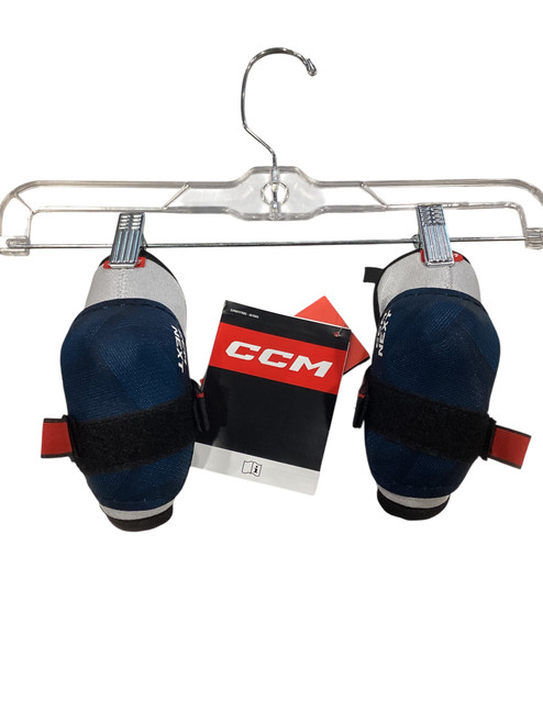 Vist Large View of Product Image Which is New CCM NEXT ELBOW PAD Youth Elbow Pads None MD