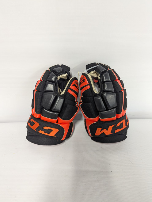 Vist Large View of Product Image Which is Used CCM CCM U+ CL Senior Gloves Black And Orange 13"