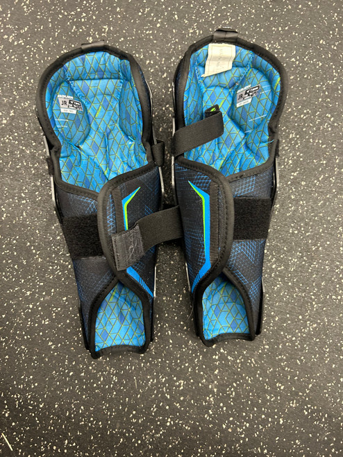 Vist Large View of Product Image Which is Used Bauer X Junior Shin Guards Black 12"