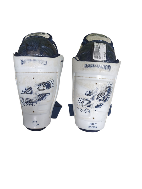 Vist Large View of Product Image Which is Used Sher-wood X4 MOMENTUM Junior Shin Guards White 8"