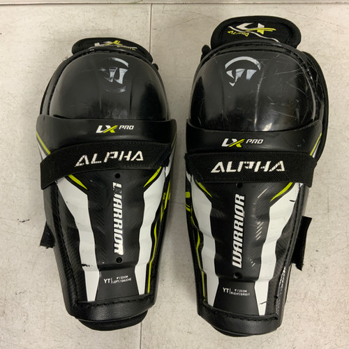 Vist Large View of Product Image Which is Used Warrior LX PRO Youth Shin Guards Yellow 9"