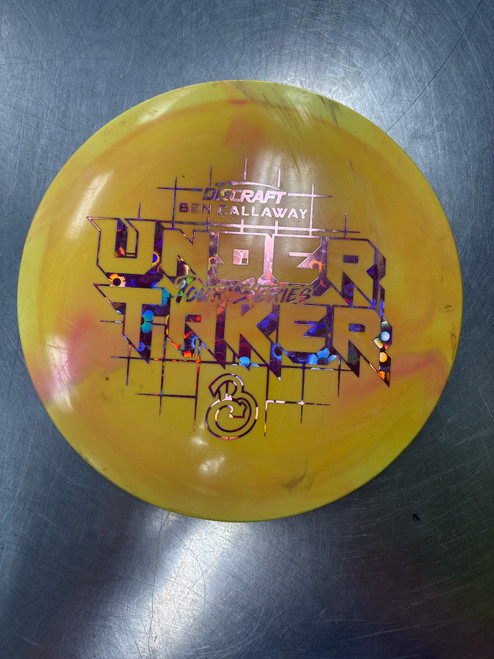 Vist Large View of Product Image Which is Used Discraft TOUR SERIES UNDERTAKER Disc Golf Driver Orange