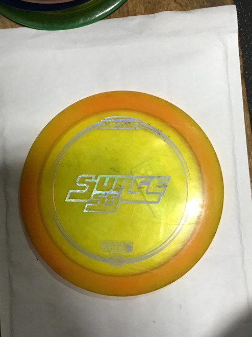Vist Large View of Product Image Which is Used Discraft ESP SURGE Disc Golf Driver Orange 174g