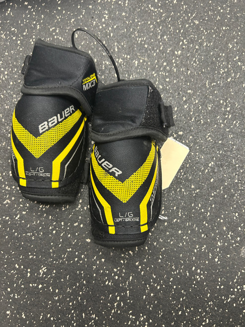 Vist Large View of Product Image Which is Used Bauer MX3 TOTAL ONE Youth Elbow Pads LG