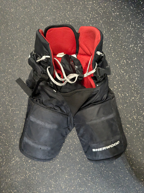 Vist Large View of Product Image Which is Used Sher-wood M65 HP Youth Pant Black XL