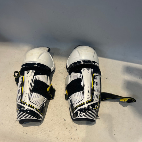 Vist Large View of Product Image Which is Used CCM TACKS Youth Shin Guards White 10"