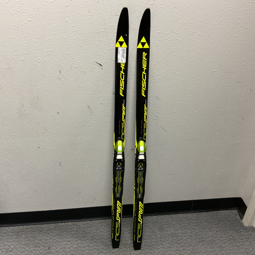 Vist Large View of Product Image Which is Used Fischer RCS SPRINT CROWN Boys XC Ski/Binding Black And Optic Yellow 120 cm