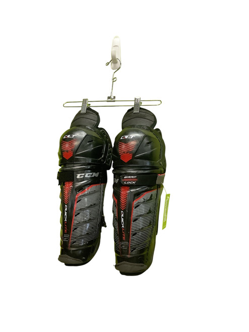 Vist Large View of Product Image Which is Used CCM QLT quicklite Junior Shin Guards Black 12"