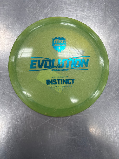 Vist Large View of Product Image Which is Used Discmania EVOLUTION FORGE INSTINCT Disc Golf Driver Green