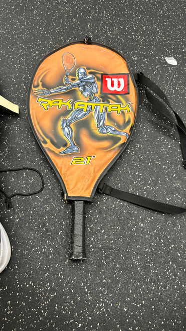 Vist Large View of Product Image Which is Used Wilson RAKATTAK Adult Tennis Racquet Orange 3 3/8"