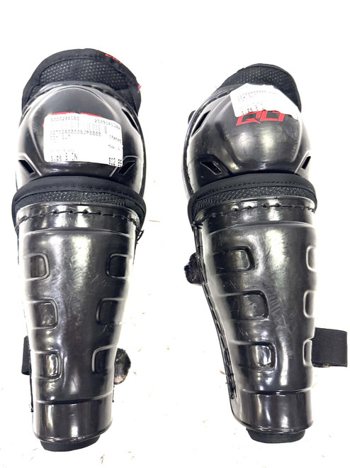 Vist Large View of Product Image Which is Used CCM QLT Youth Shin Guards Black 8"