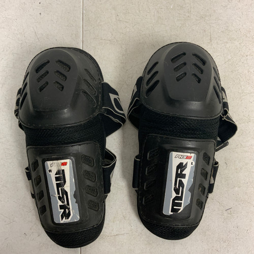 Vist Large View of Product Image Which is Used MSR RG2 Junior Knee Guard Black Junior