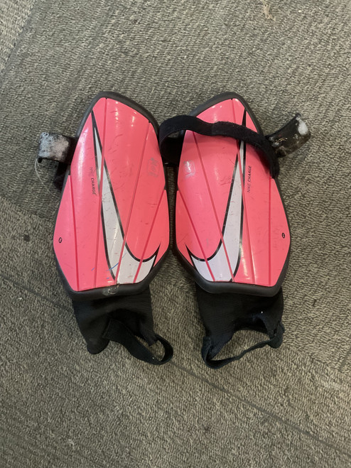 Vist Large View of Product Image Which is Used Nike CHARGE Soccer Shin Guards Youth Pink LG