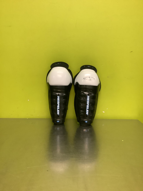Vist Large View of Product Image Which is Used Hespeler GX 300 Youth Shin Guards Black 8"
