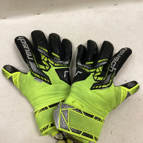 Vist Large View of Product Image Which is Used Reusch ATTRAKT Soccer Goalie Gloves Black And Optic Yellow 9