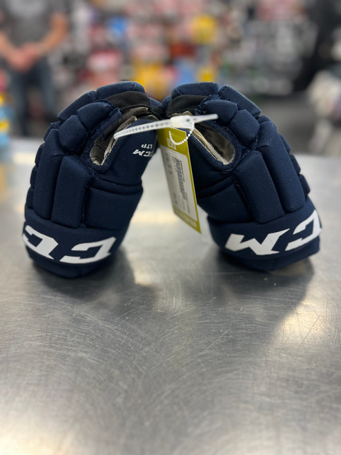 Vist Large View of Product Image Which is Used CCM LTP Junior Gloves Navy Blue 10"