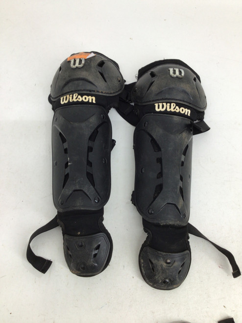 Vist Large View of Product Image Which is Used Wilson CATCHER YOUTH SHINGUARDS Catchers Leg Guards Black Youth