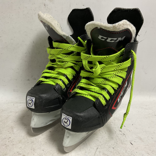 Vist Large View of Product Image Which is Used CCM JETSPEED FT340 Junior Hockey Skate White/Black/Red Junior 02