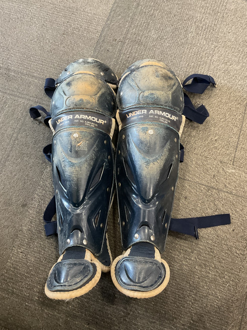 Vist Large View of Product Image Which is Used Under Armour UALG2-JRVS Catchers Leg Guards Navy Blue Junior