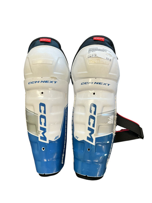 Vist Large View of Product Image Which is Used CCM NEXT Junior Shin Guards White 9"