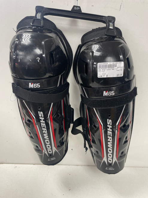 Vist Large View of Product Image Which is Used Sher-wood M65 Junior Shin Guards Black 11"