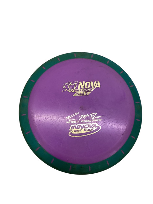 Vist Large View of Product Image Which is Used Innova XT NOVA PUTT AND APPROACH Disc Golf Putter Purple