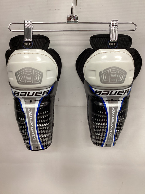 Vist Large View of Product Image Which is Used Bauer SUPREME Youth Shin Guards Black 8"