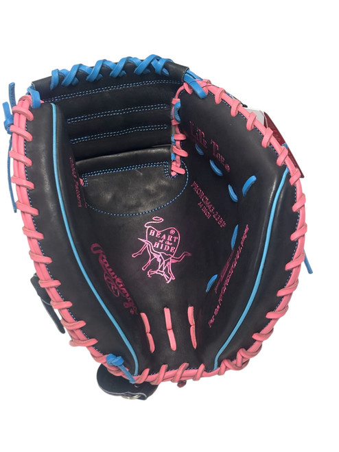 Vist Large View of Product Image Which is New Rawlings HEART OF THE HIDE R2G PRORCM43-23BP Baseball Catchers Mitt RH Throw Black And Pink 34"