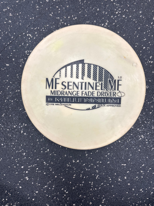 Vist Large View of Product Image Which is Used Millennium SENTINEL MF Disc Golf Mid Range Tan