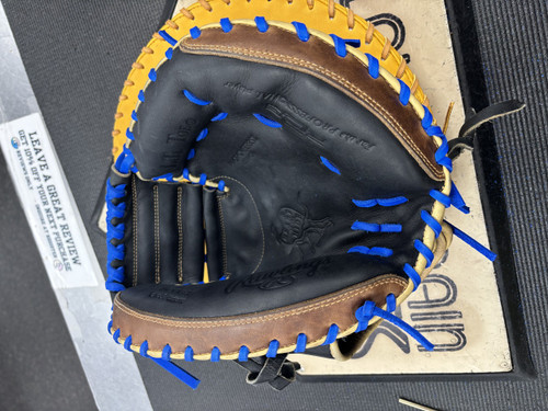 Vist Large View of Product Image Which is Used Rawlings HEART OF THE HIDE CM33 BB/SB Catchers RH Throw Brown And Black 33"