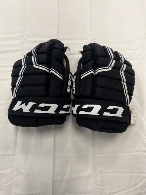 Vist Large View of Product Image Which is Used CCM 230 Youth Gloves Black 9"