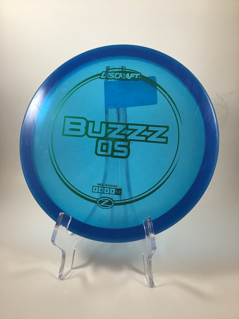 Used Discraft Z BUZZZ OS Disc Golf Mid Range Royal Blue 180g 10105-S000293601 Vist Large View of Product Image Which is Used Discraft Z BUZZZ OS Disc Golf Mid Range Royal Blue 180g