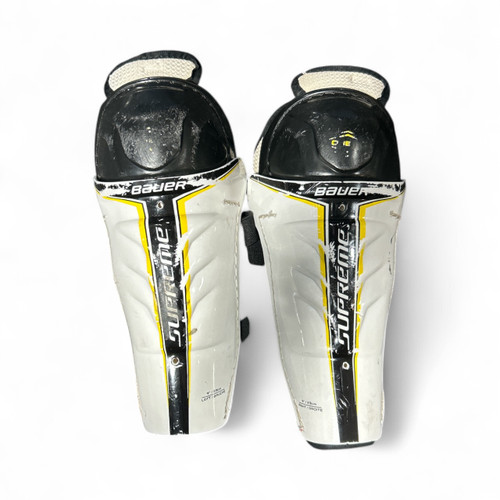 Vist Large View of Product Image Which is Used Bauer SUPREME Youth Shin Guards White 9"