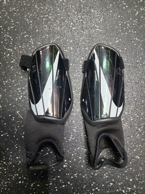Vist Large View of Product Image Which is Used Nike Soccer Shin Guards Youth Black SM