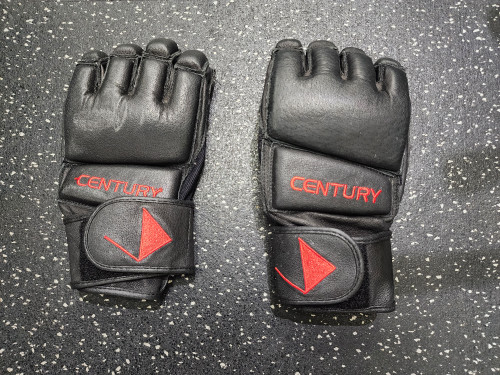 Vist Large View of Product Image Which is Used Century Heavy Bag Gloves Black LG