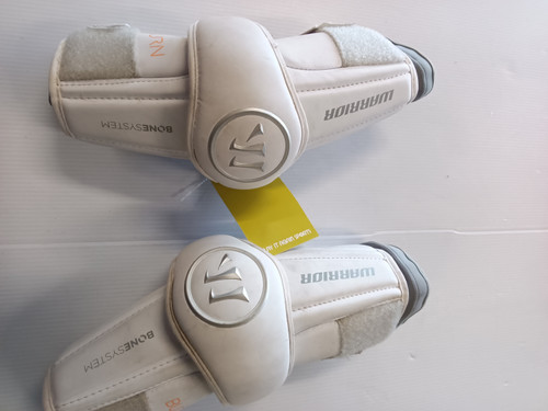 Used Warrior BURN Lacrosse Arm Pads/Guards White LG 11779-S000199525 Vist Large View of Product Image Which is Used Warrior BURN Lacrosse Arm Pads/Guards White LG
