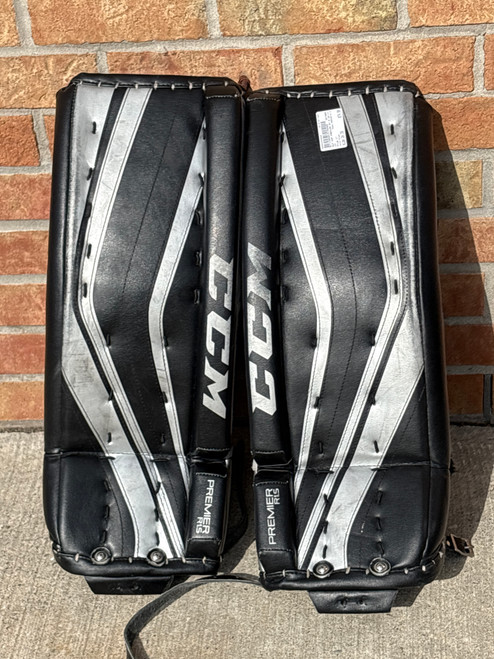 Vist Large View of Product Image Which is Used CCM PREMIER R1.5 Goalie Leg Pads Youth Black 24"