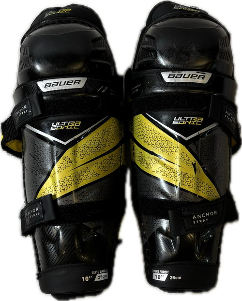 Vist Large View of Product Image Which is Used Bauer ULTRA SONIC Youth Shin Guards Black 10"