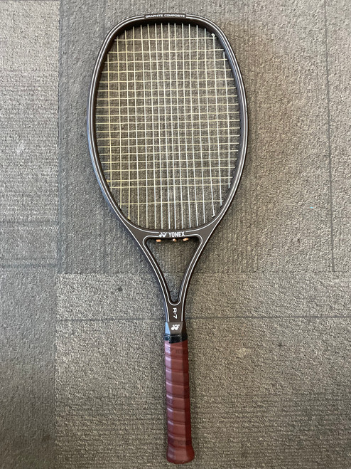 Used Yonex R-7 Adult Tennis Racquet Brown 4 3/8" 11614-S000224074 Vist Large View of Product Image Which is Used Yonex R-7 Adult Tennis Racquet Brown 4 3/8"