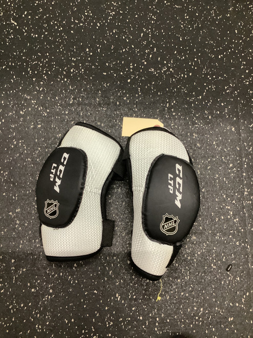 Vist Large View of Product Image Which is Used CCM LTP Junior Elbow Pads White SM