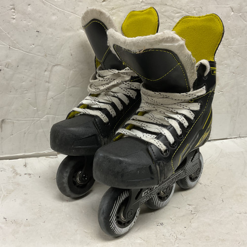 Vist Large View of Product Image Which is Used CCM SUPER TACKS 9350 R Child Roller Quad Skates Black Youth 13.0
