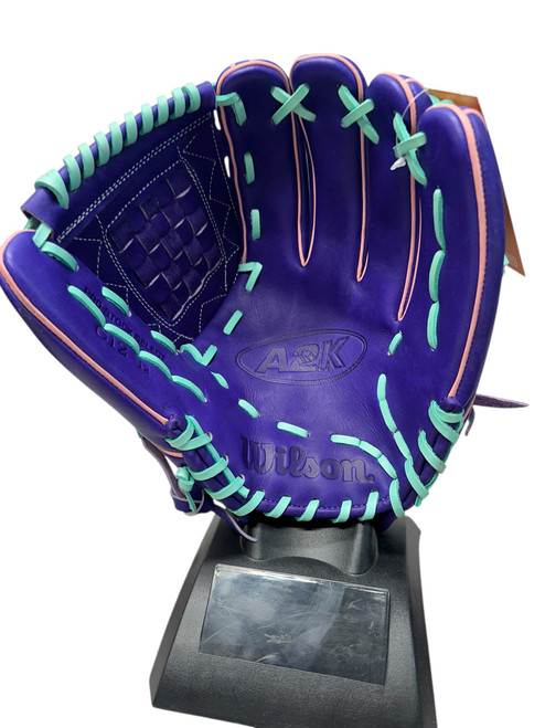 Vist Large View of Product Image Which is Used Wilson C12 BB/SB Glove RH Throw Purple And Pink 12"